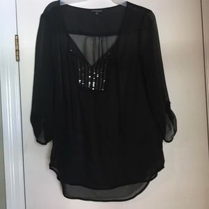 Sheer black blouse